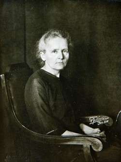 ★ DD : Disclaimerized Depiction ; ★   Marie Curie, neé Manya Sklodowska (1867--1934), was born in Warsaw. She immigrated to France in 1891 and studied at the Sorbonne. She worked with her husband, Pierre Curie (1859--1906), also a student and later professor at the Sorbonne, on magnetism and radioactivity. The Curies and French physicist Antoine Henri Becquerel (1852--1908) shared the 1903 Nobel Prize for Physics for their discovery of radioactivity. After her husband's death, Marie succeeded to his university chair. In 1911 she won a second Nobel, the prize for chemistry, for her work in isolating the elements polonium and radium. She died of leukemia, probably caused by extended exposure to radiation. This photograph of Curie is from the archives of the League of Nations. Factcheck Library of Congress