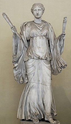 I sing of Artemis, whose shafts are of gold, who cheers on the hounds, the pure maiden, shooter of stags, who delights in archery, own sister to Apollo with the golden sword. Over the shadowy hills and windy peaks she draws her golden bow, rejoicing in the chase, and sends out grievous shafts. The tops of the high mountains tremble and the tangled wood echoes awesomely with the outcry of beasts: earthquakes and the sea also where fishes shoal.  — Homeric Hymn 27 to Artemis