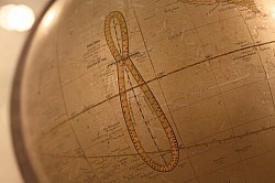 Analemmas were often depicted on early globes. One such example is the terrestrial globe by George Woodward, made in 1846. In 1812, John Lathrop wrote: What is called the analemma, on the globe, is a narrow slip of paper, the length of which is equal to the breadth of the torrid zone. It is pasted on some vacant place on the globe, in the torrid zone, and is divided into months and days of months, correspondent to the sun's declination for every day in the year.